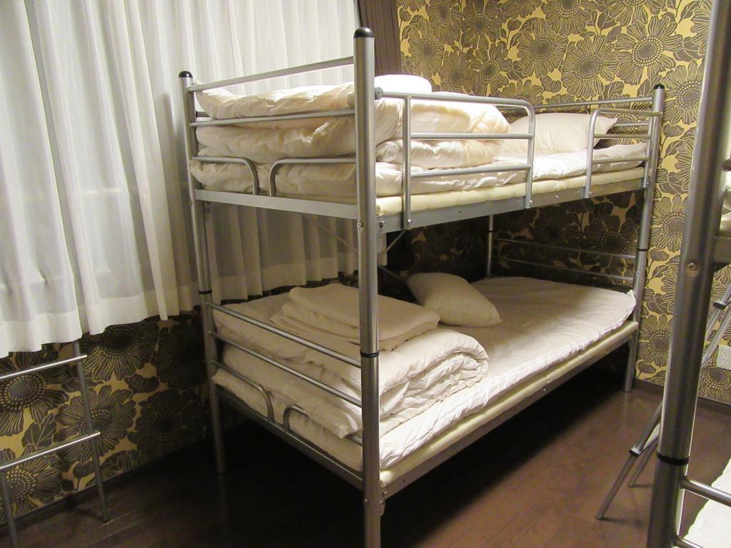 Guesthouse Tiga Kumamoto Kamer foto