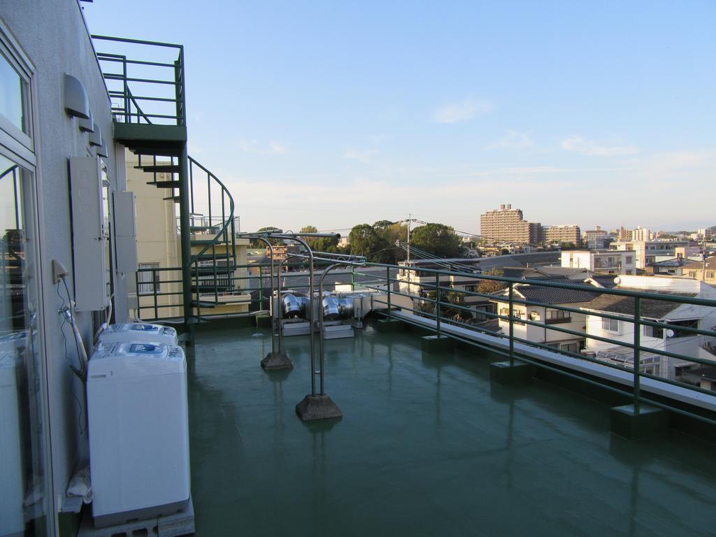Guesthouse Tiga Kumamoto Buitenkant foto