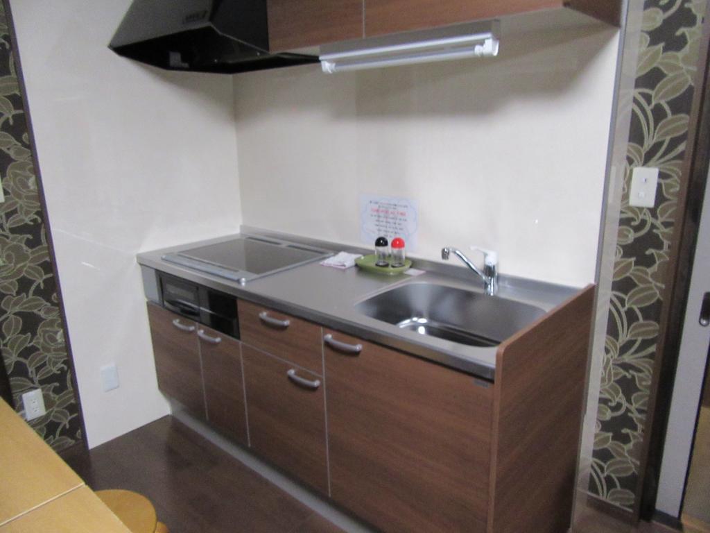 Guesthouse Tiga Kumamoto Kamer foto