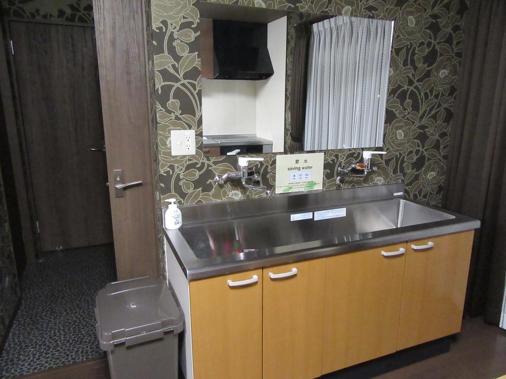 Guesthouse Tiga Kumamoto Buitenkant foto
