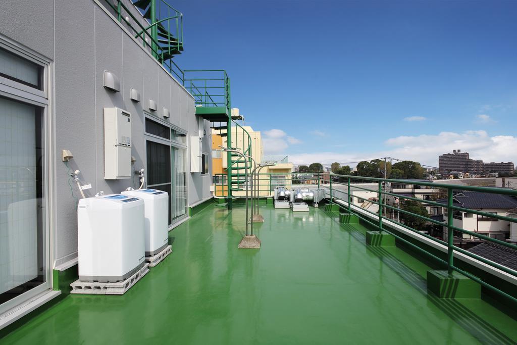 Guesthouse Tiga Kumamoto Kamer foto