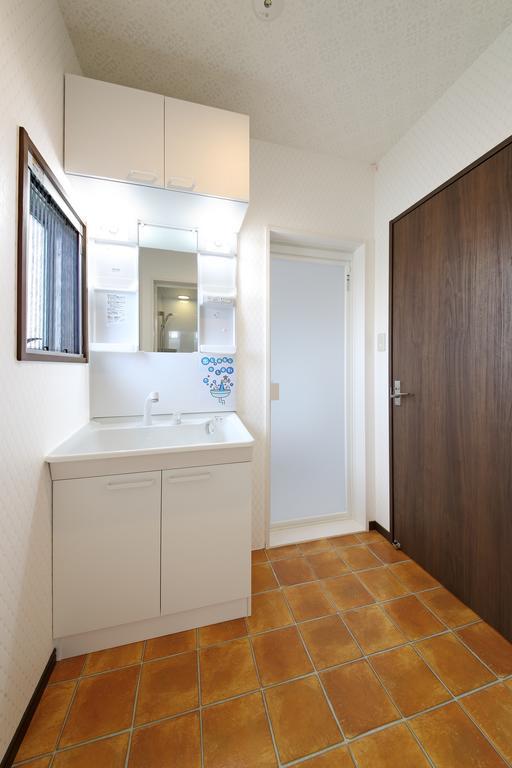 Guesthouse Tiga Kumamoto Kamer foto