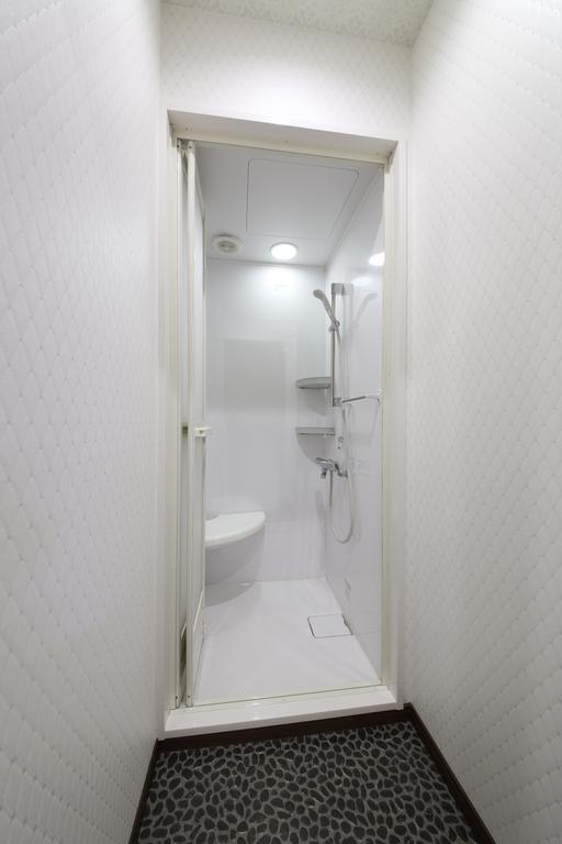 Guesthouse Tiga Kumamoto Kamer foto