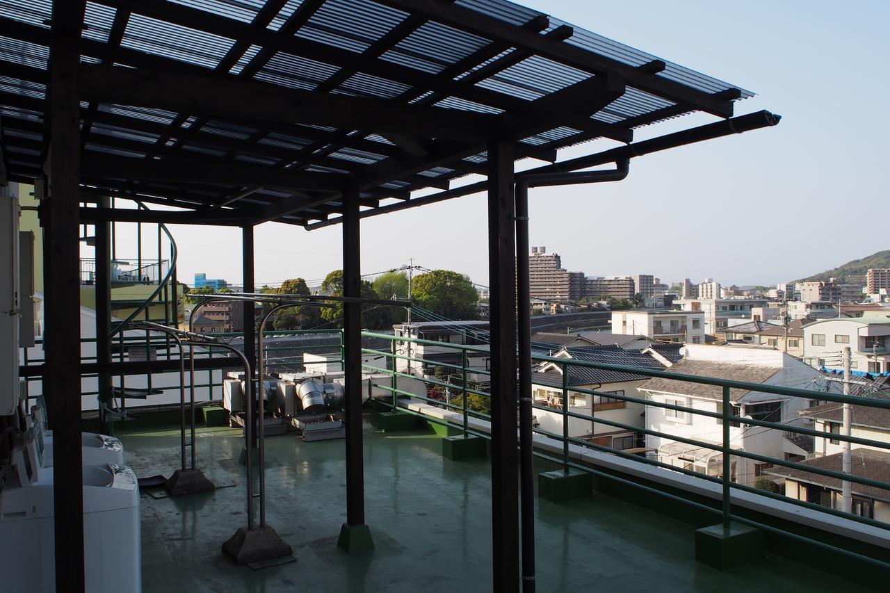 Guesthouse Tiga Kumamoto Buitenkant foto